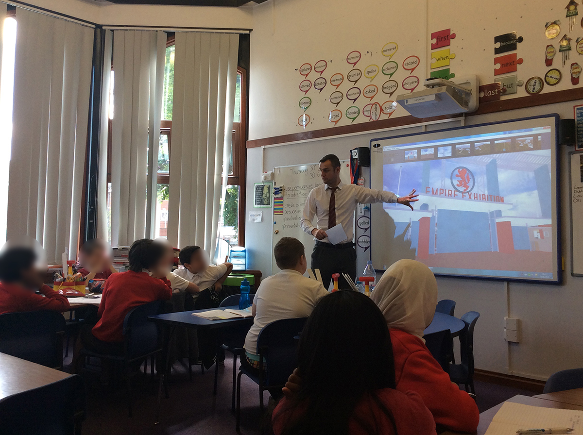 A primary school teacher leading a class in interpreting the 3D model and associated materials